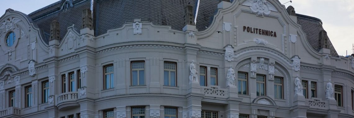 a large building with a clock on the top of it